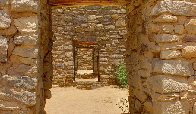 Stone pathways leading through old structures